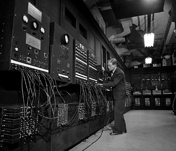The ENIAC computer with its co-inventor, John W. Mauchly. Source: Bettmann/Corbis