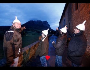 On December 20, 2012, people like those in this picture gathered in the village of Bugarach  to witness the end of the World.   Source: Patrick Aventurier/Getty Images